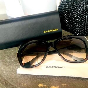 Black balenciaga lenses with semi-used coffee